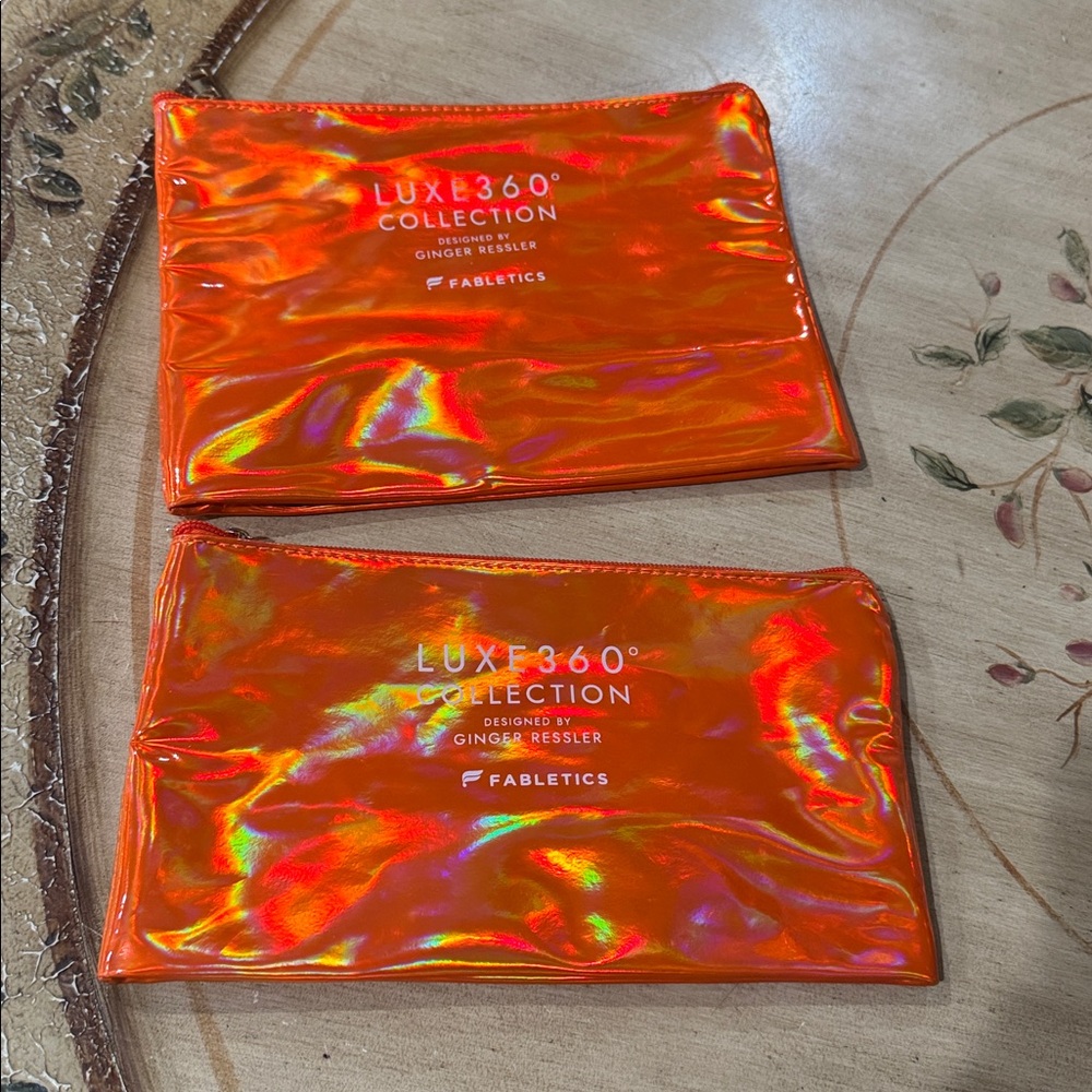 Fabletics ORANGE LUXE360• Collection, set of 2 clutch/bag By Ginger Ressler